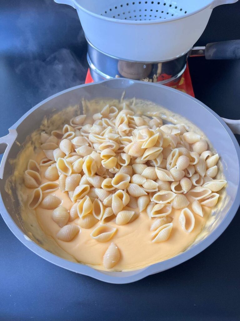 high protein mac and cheese in the pan before being mixed