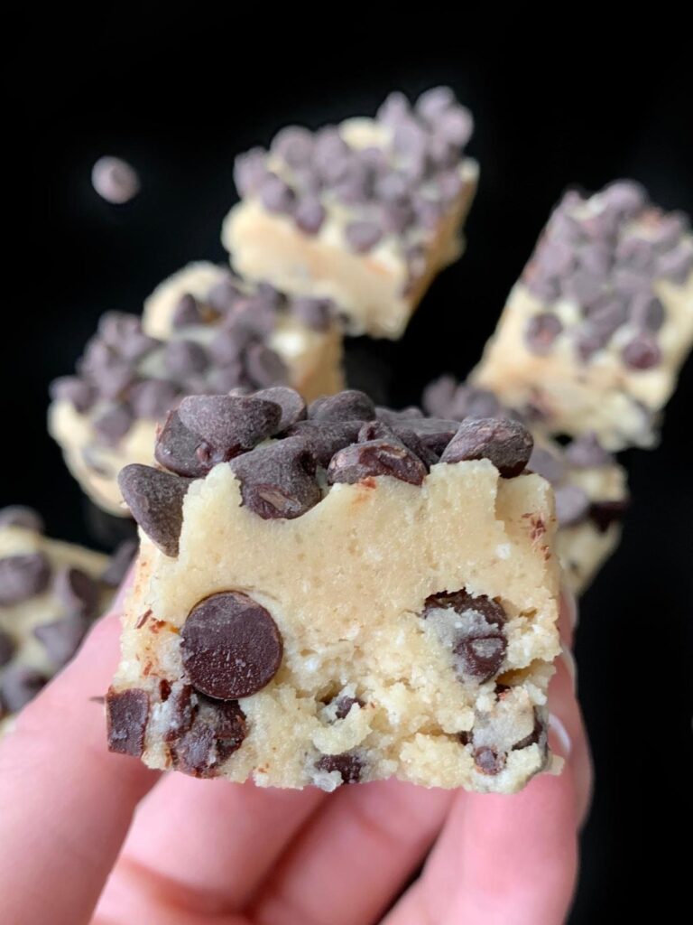 hand holding a keto cookie dough bar