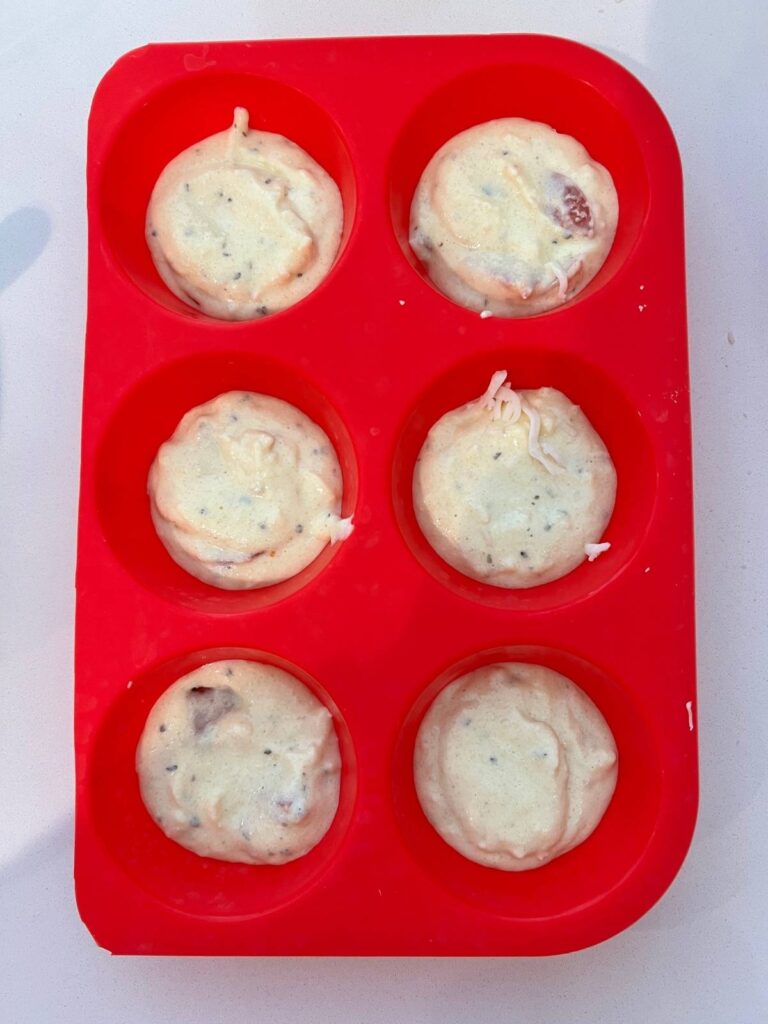 batter distributed into muffin cups