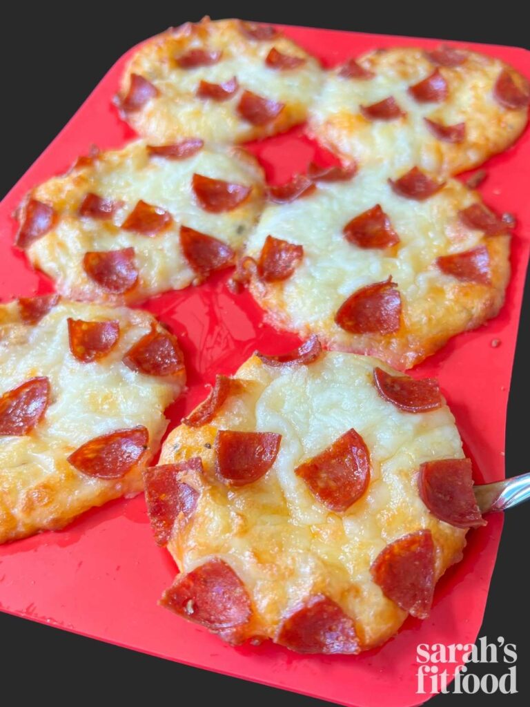 a tray of keto pizza muffins