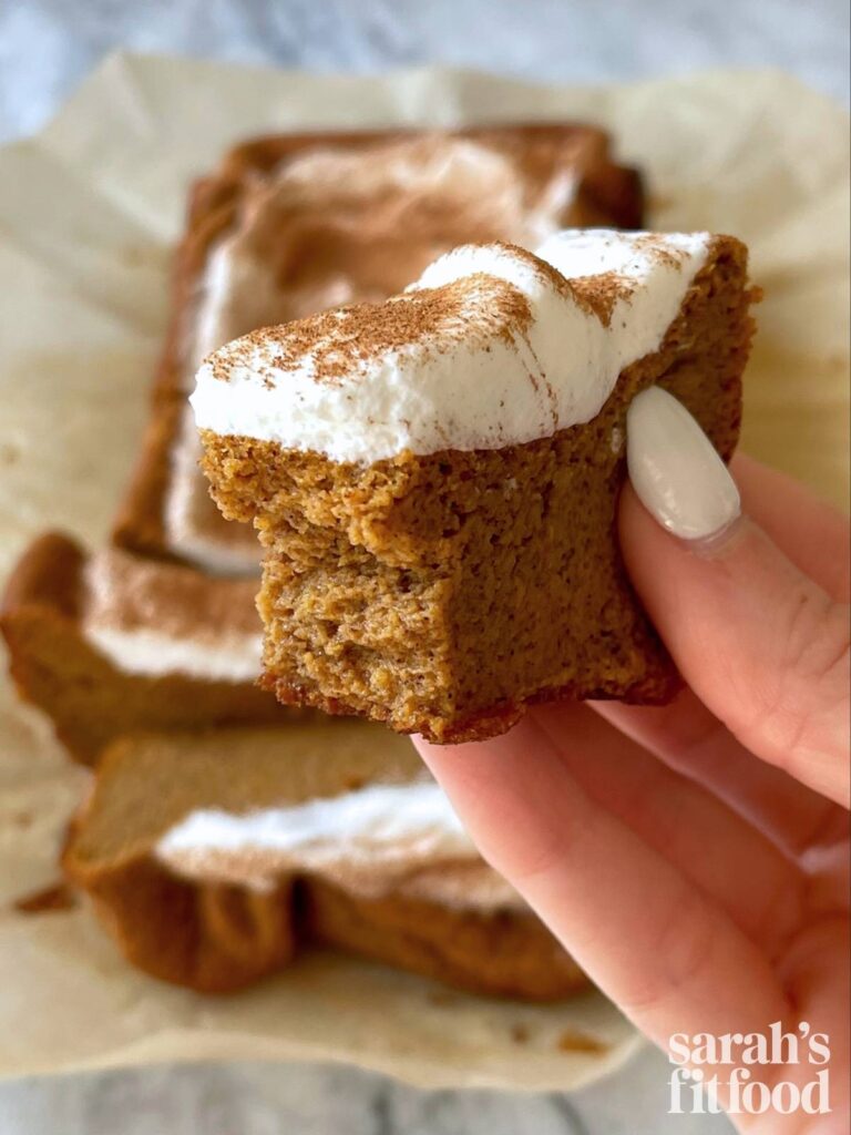 hand holding up a slice of gluten free sweet potato bread