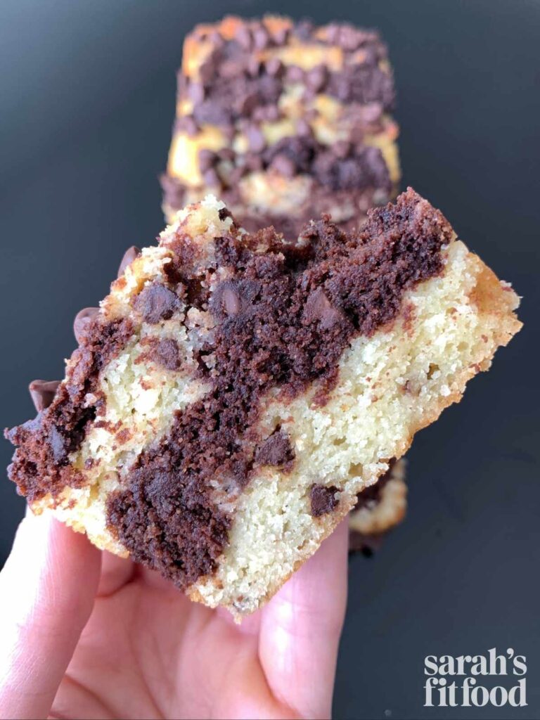 keto marble pound cake slice with a bite taken out