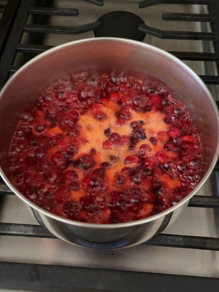 cranberry sauce starting to thicken while cooking